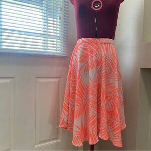 Dynamite women tangerine floral lined polyester midi swing skirt. Size S. Used.
